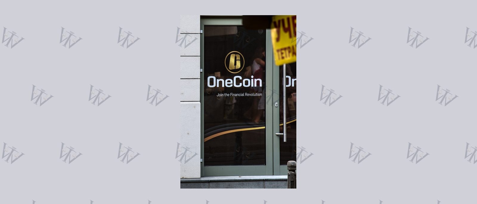 OneCoin logo on office door
